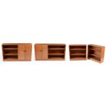 Glenaire: pair of mid 20th C teak side units; and two matching bookcases.