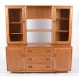 Ercol: an elm Windsor dresser/display unit.