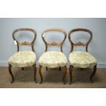 Three Victorian rosewood balloon back dining chairs