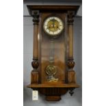 A Vienna walnut and beech wall clock, circa 1900