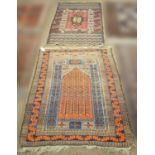 South West Persian prayer rug; and a Caucasian rug.