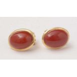 A pair of red coral and 18ct yellow gold mounted earrings,