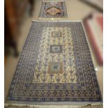 Modern Persian rug; and a North West Persian prayer rug.