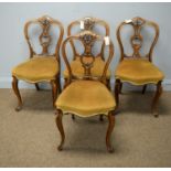 Set of four ornate Victorian balloon back chairs.