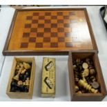 Chess sets and a board, and a set of British dominoes in tin case.