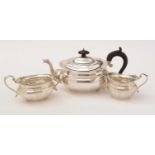 A three piece silver tea service