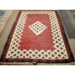 A Kelim rug.