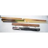 Selection of eight snooker/pool cues.
