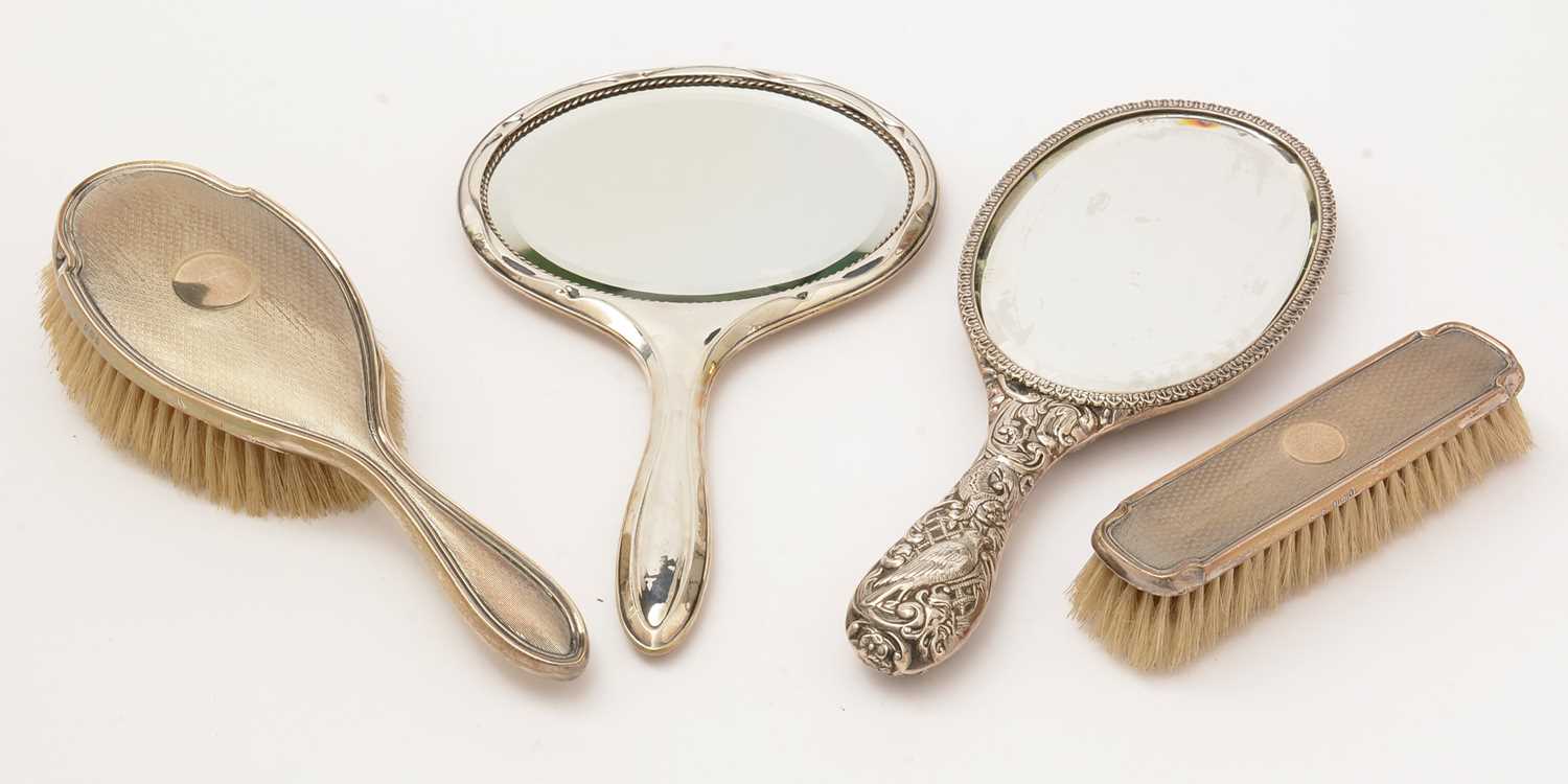 Victorian and later silver hand mirrors and brushes.