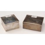 Two silver mounted cigarette boxes,