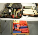 Selection of model railway trains, carriages and rolling stock.
