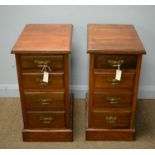 Pair of walnut narrow chests of four drawers.