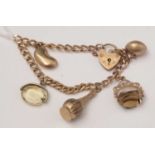 A 9ct yellow gold charm bracelet,