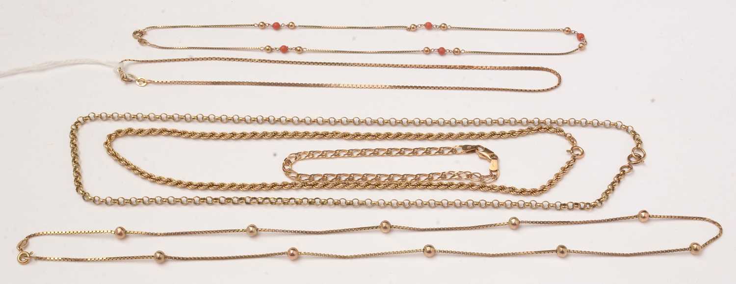 A selection of 9ct gold and yellow metal chains,