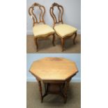 Two ornate Victorian dining chairs; an Edwardian centre table