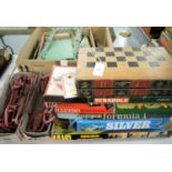 Assorted collection of board games and toys.