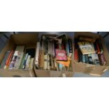 Three boxes of books, assorted subjects.