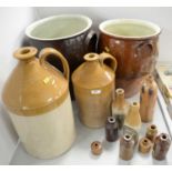 A collection of stoneware bottles