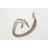 An antique 9ct rose gold double Albert watch chain