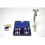 Small silver items, including a spill vase, a cased set of teaspoons and a cruet set