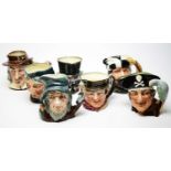 A collection of seven Royal Doulton Toby Jugs.
