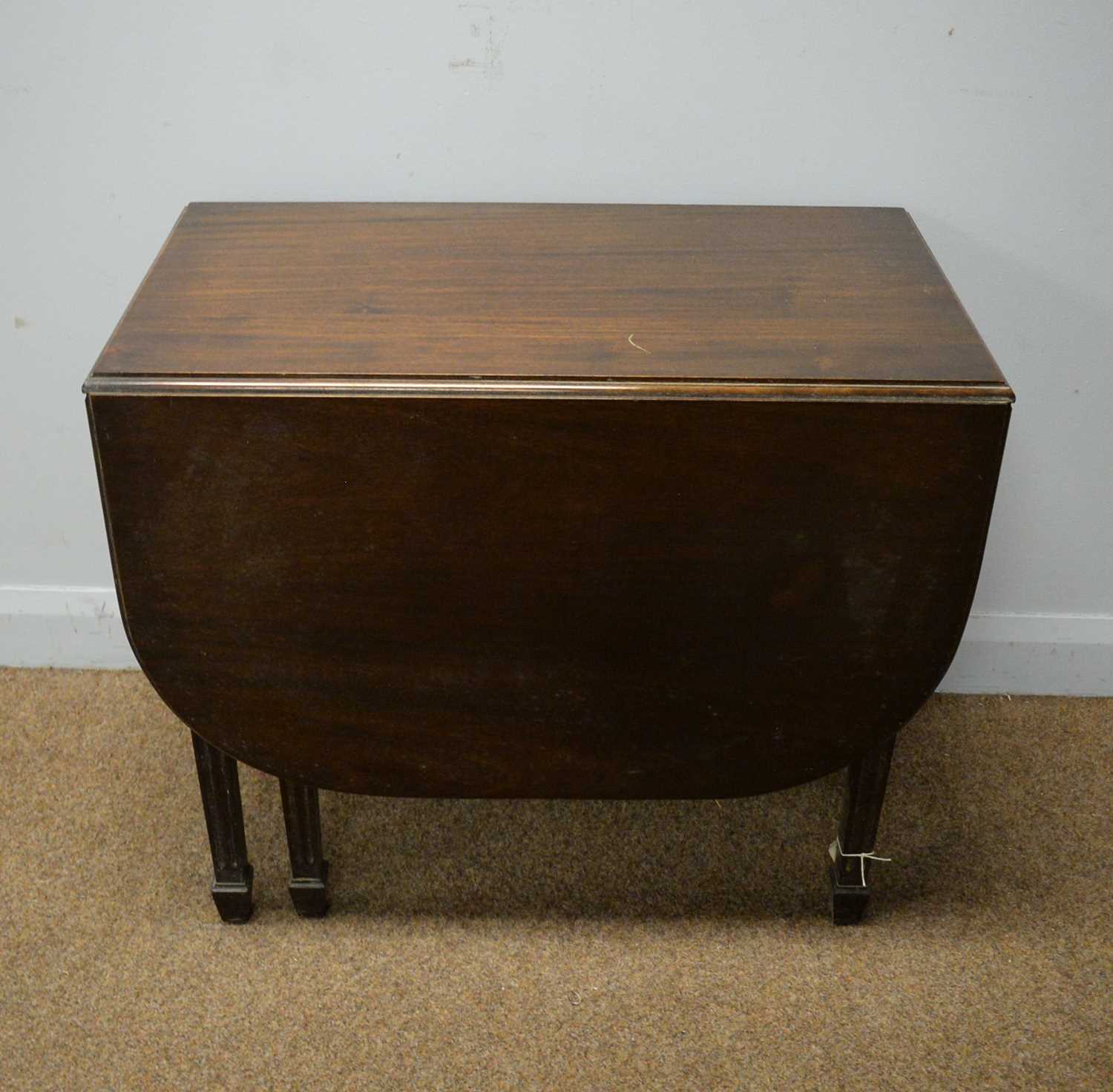 Early 20th C mahogany drop leaf dining table.