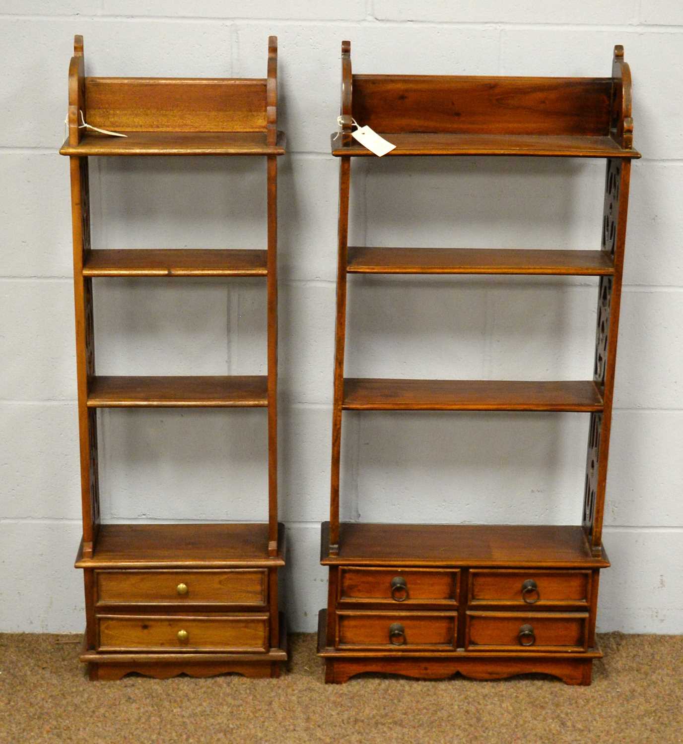 Pair of 20th C waterfall bookcases.