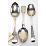 A George III silver marriage spoon and two Victorian silver tablespoons