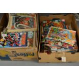 A collection of Marvel, DC and other comic books