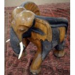 An African carved elephant chair.