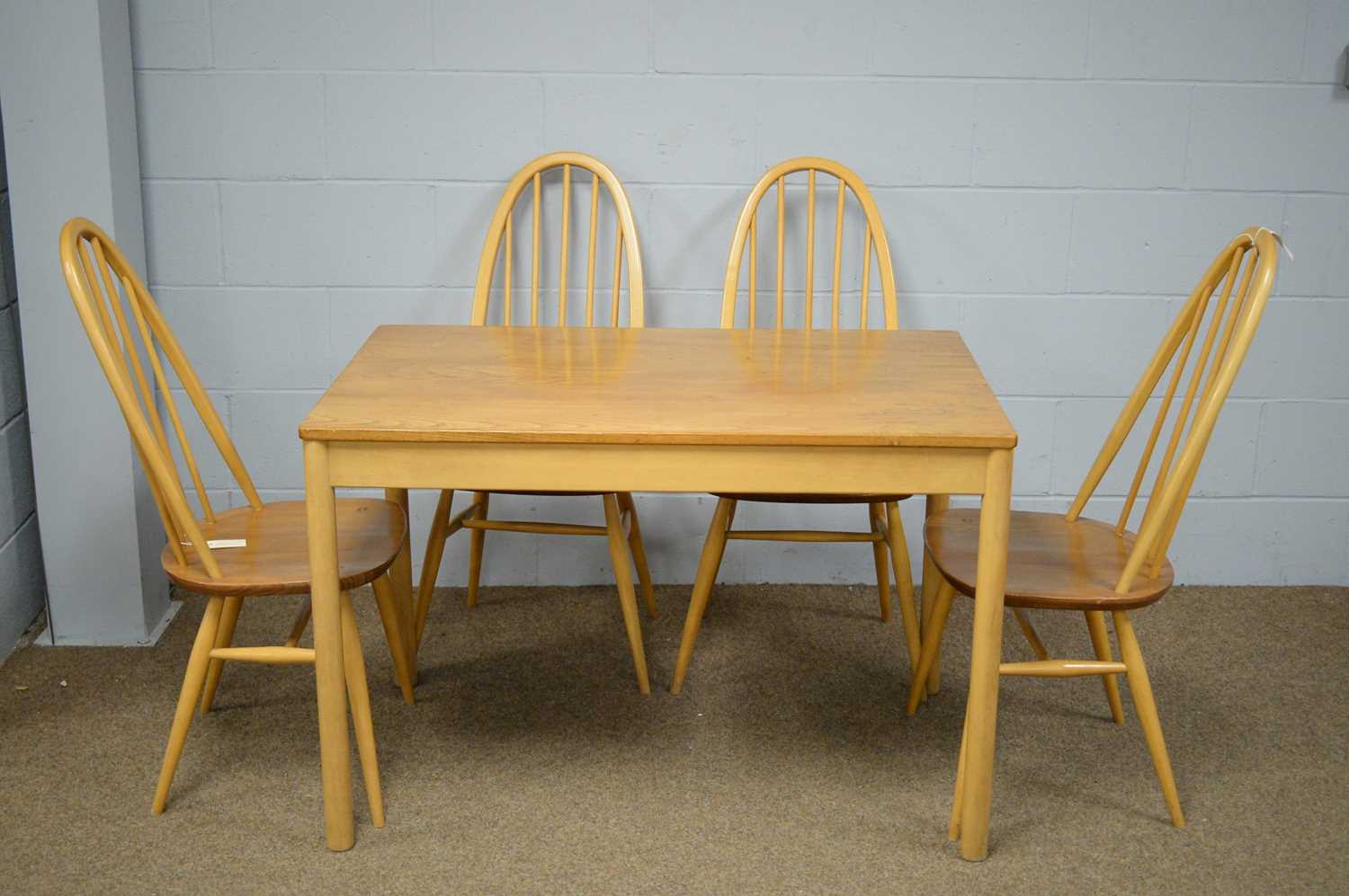 Set of four Ercol quaker chairs; and an Ercol style dining table.