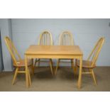 Set of four Ercol quaker chairs; and an Ercol style dining table.