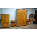 Early 20th C five-piece walnut bedroom suite.