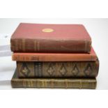 A selection of antique books including Rudyard Kipling and others