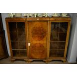 Early 20th C Heals of London walnut breakfront bookcase.