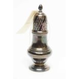 An Elizabeth II silver sugar caster.