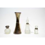 A 1920s silver-mounted perfume bottle, scent bottles, and an Edwardian silver vase