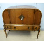 An Art Deco oak drinks cabinet