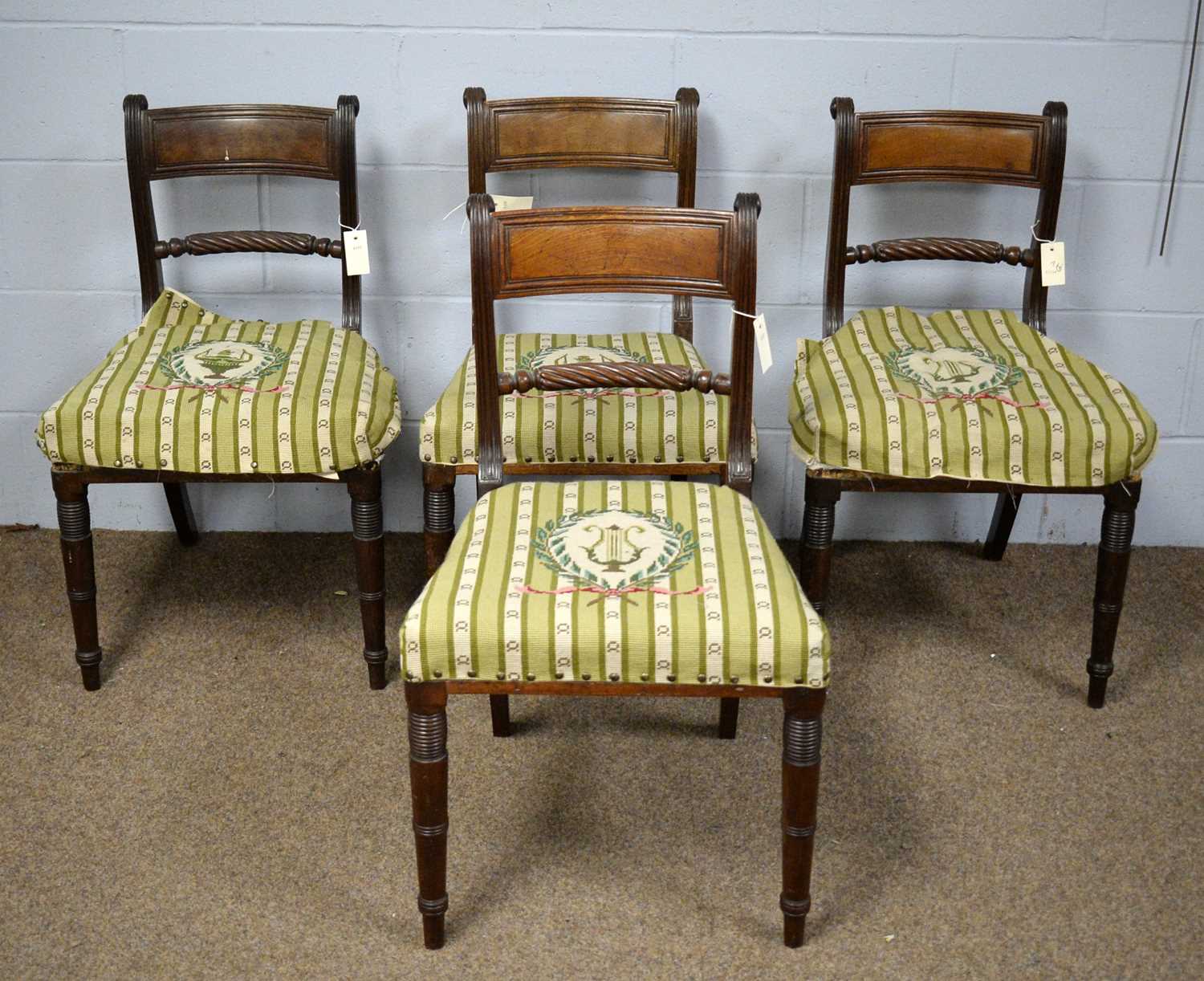 A set of four George IV mahogany dining chairs