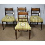 A set of four George IV mahogany dining chairs