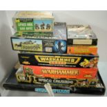 A collection of Warhammer and other board games