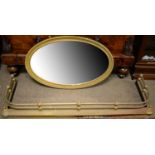 20th Century wall mirror and a brass fender