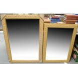 Two bevelled wall mirrors