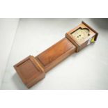 An early 20th Century miniature mahogany longcase clock