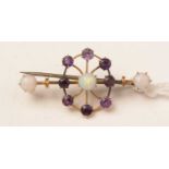 An Edwardian opal and amethyst bar brooch.