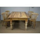 20th C pine table; and four Windsor style chairs.