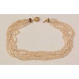 A multi-strand cultured baroque pearl necklace