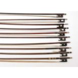 A bundle of ten violin bows