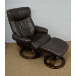 Stressless-type armchair; and an ottoman.