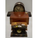 Two clocks; and two wooden boxes.